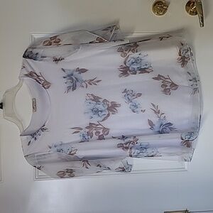 Women's blouse with blue and brown flowers, size M.
